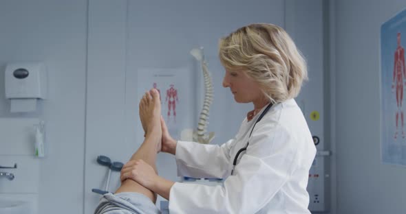Physiotherapist at work in a hospital alt