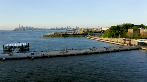 Aerial Shot of a Pier Next to an Urban Neighborhood (Bay Ridge, Brooklyn, New York)