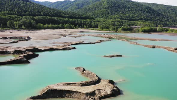 Drone View of the Turquoise Lake Formed As a Result of Mining Waste