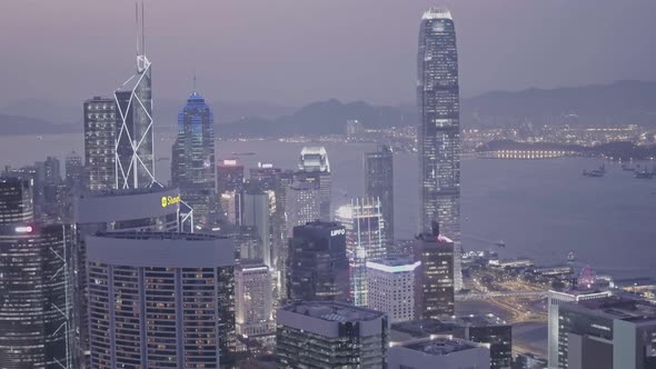 International Commerce Centre and Hong Kong downtown city skyline at night. Aerial drone view