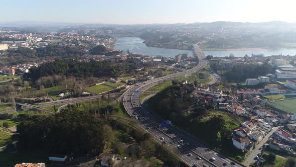 Aerial View of Busy Bypass and Ring Road at City Entrance. Cars and Buses Going Into Traffic