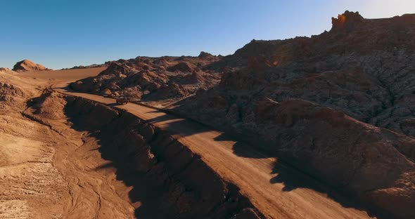 The Car Rides Along a Scenic Road in the Popular Among Tourists Moon Valley in Atacama Desert, Chile