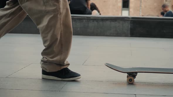 BARCELONA SPAIN 20 MAY 2019: Group of Skaters Friends Performing Trick Nollie Flip Noseslide in