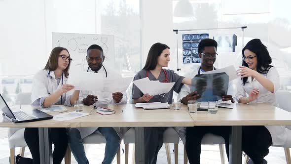 Team of Doctors Having a Meeting in Conference Room