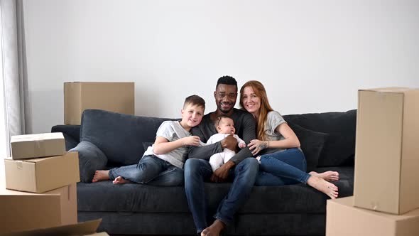 Happy Multiracial Family Moved in a New House