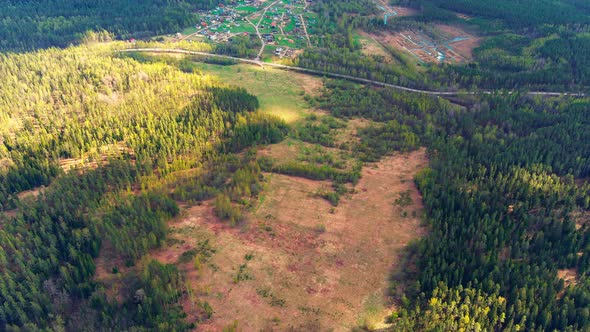 Aerial View of Fields with Forests on a Spring Sunny Day a Magical Landscape with Treetops Lakes in