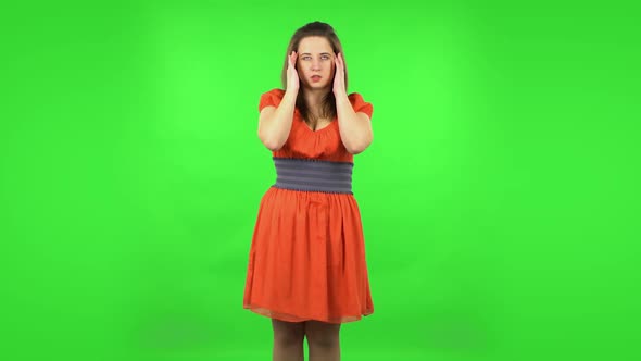 Cute Girl Suffering From Headache From Fatigue . Green Screen