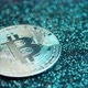 Bitcoin coin on a background that changes colors - VideoHive Item for Sale