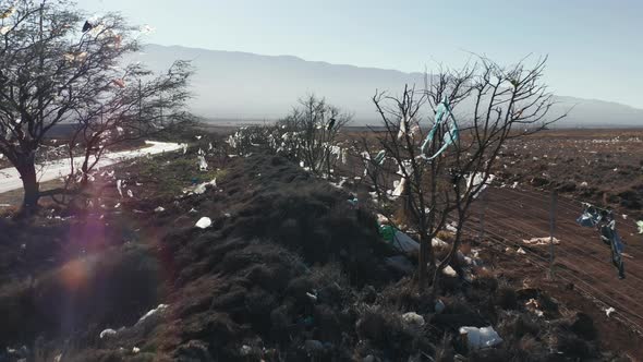 Garbage Pollution Flying Over the Dump in Countryside Landfill  Aerial