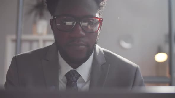 Portrait of Serious Afro-American Businessman at Work in the Office