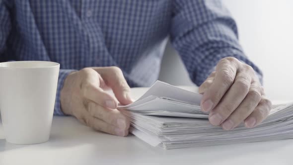 The Clerk Hands are Working with Paper Files