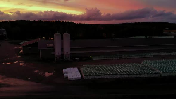 red color poultry farm in Finland at very beautiful sunset