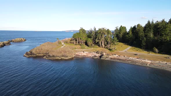 Drone approaching Neck Point Park in Nanaimo, British Columbia during late afternoon with medium spe