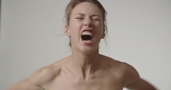 Beautiful Young Woman Shouting In Anger