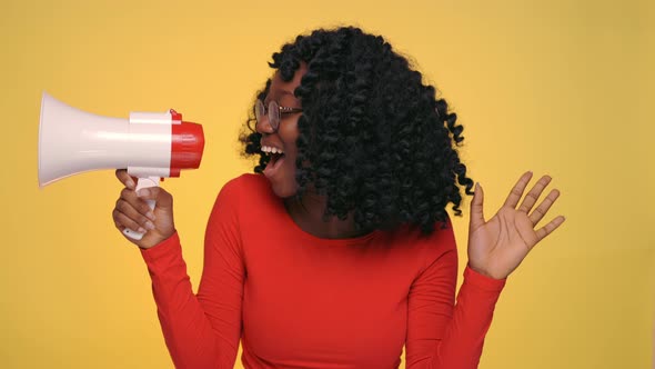 African American Woman Shouting Emotionally in Loudspeaker