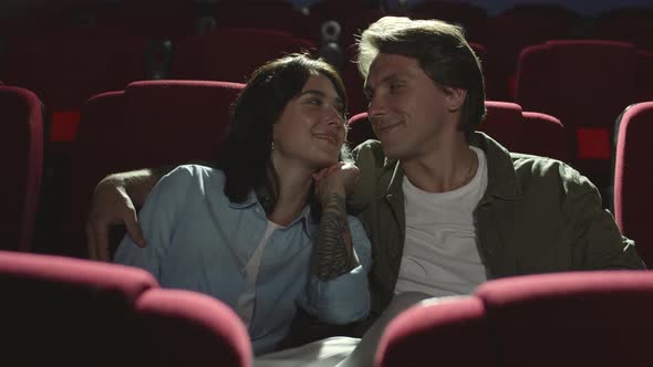 Portrait of Loving Couple in Cinema