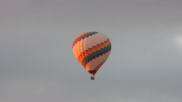 Hot Air Balloon Flying in Still Cloudless Clear Sky