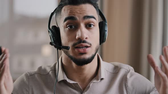 Webcam View Young Hispanic Business Man Designer Blogger Operator Wear Headset Talk at Camera