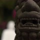 Lion Protector Near Meditating Buddha Statue at Temple - VideoHive Item for Sale