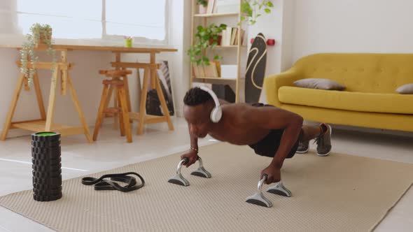 African Man Doing Push Ups at Home