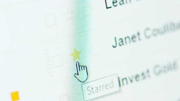 Macro shot of email inbox browsing on a computer monitor