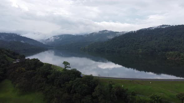 Aerial move toward calm reflection dam