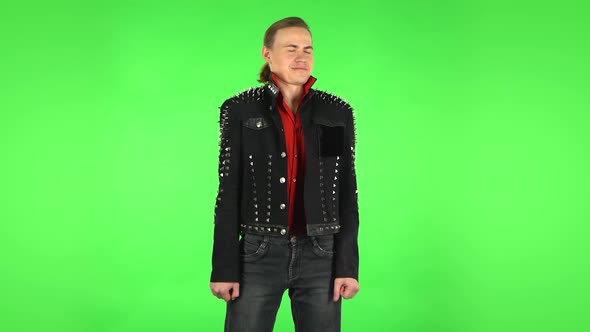 Guy Showing Disgust for Bad Smell or Taste. Green Screen