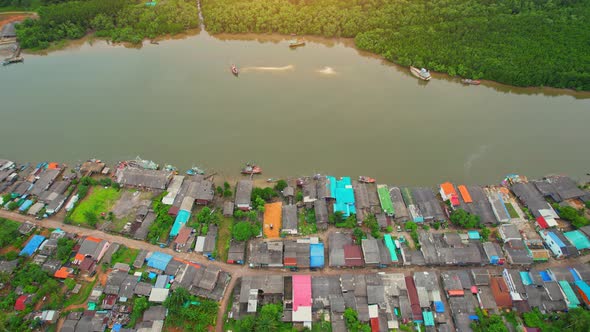A drone is flying over a fishing village