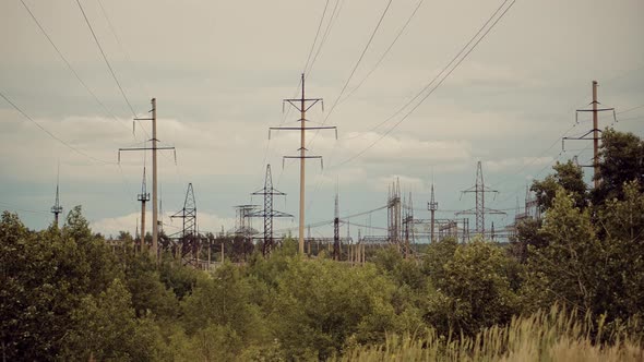 Electricity Transportation Industry Energetics. Power Lines And Blue Sky Time Lapse. High Voltage.