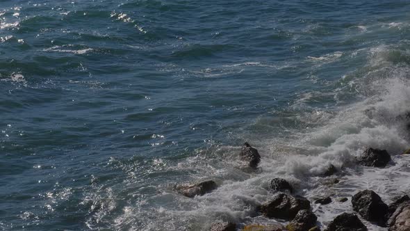 Top View of the Ocean Waves on a Sunny Day