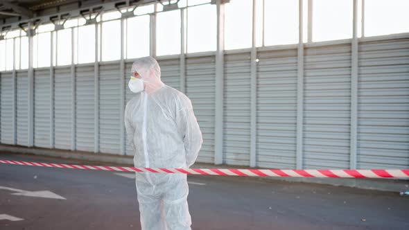 Man Epidemiologist Showing Stop Sign Standing Restricted Area Warning Red White Tape Coronavirus