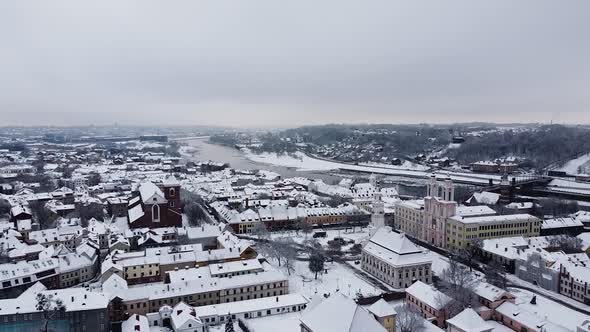 Ascending aerial shot of Kaunas Old Town during winter season