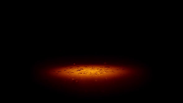 Water Drop In Orange Spot Light On Black Background. Liquid Drops In Slowmotion