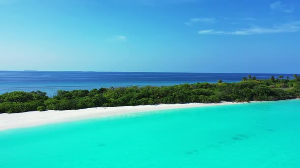 Aerial flying over texture of marine coast beach trip by blue lagoon with white sandy background of 