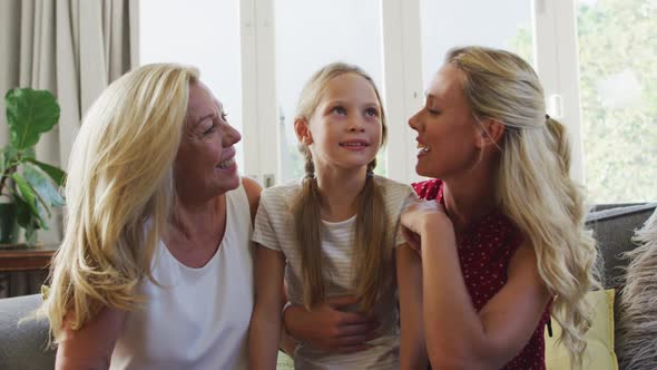 Caucasian woman spending time with her mother and her daughter