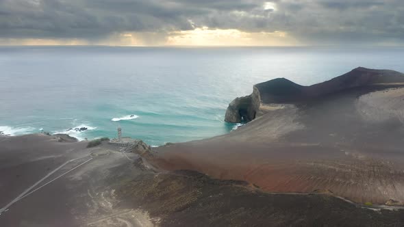 The Coastal Peninsula of Ponta Dos Capelinhos with a Sunset in Behind