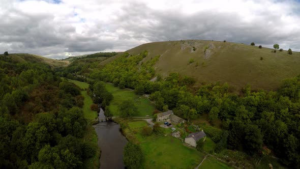 Aerial view of the farm by Headstone viaduct, bridge in the Derbyshire Peak District National Park,