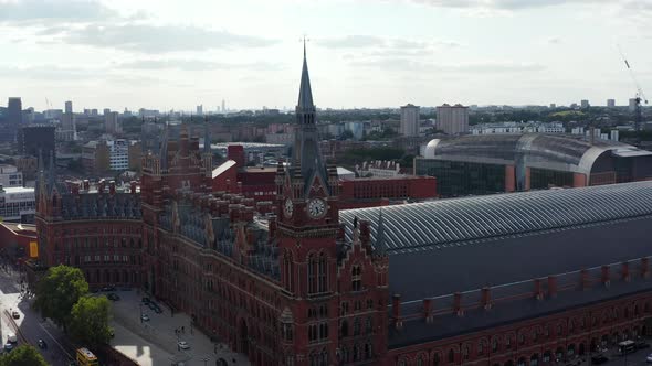 Slide and Pan Shot of Historic Brick Building in Victorian Style