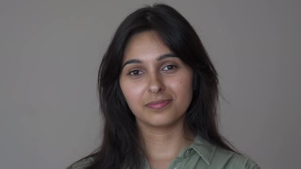 Confident Smiling Indian Business Woman Look at Camera on Brown Background