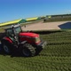 Copter flying around tractors in a silo on a farm - VideoHive Item for Sale