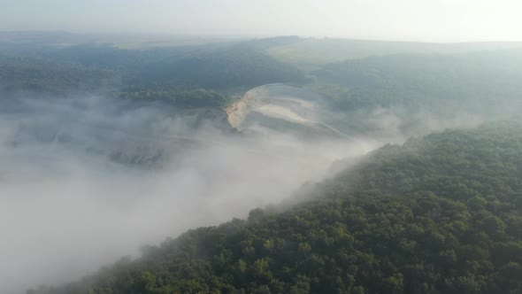 Aerial View of Open Pit Mining of Limestone Materials for Construction Industry with Excavators and