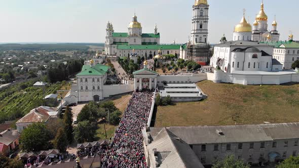 Top view of the Pochaev Lavra at the moment when a lot of people enter it