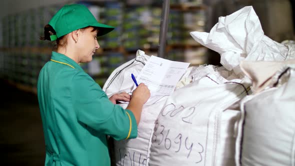 CHERKASY UKRAINE AUGUST 24 2018 Portrait of Woman Employee of Agricultural Enterprise Fills Out