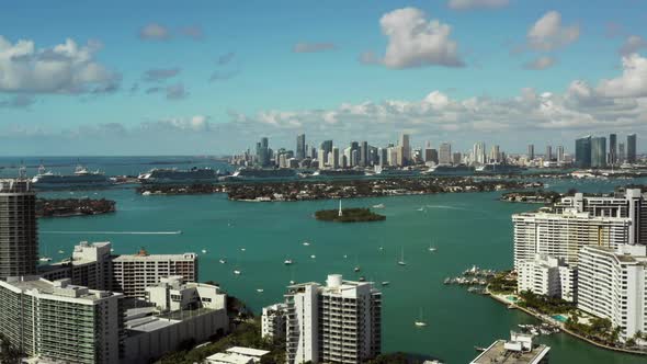 Aerial video Miami Beach harbor scene with sailboats