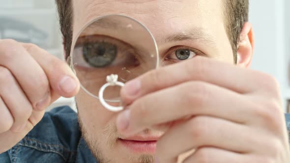 Examining Ring Through Loupe