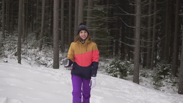 Happy Smiling Woman in Winter Cloths Outdoors in Forest