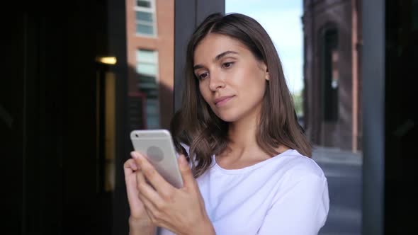 Beautiful Girl Browsing on Smartphone, Using Phone