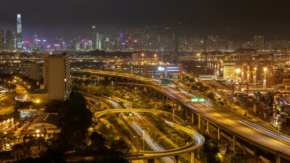 Hong Kong Container Port Terminal and Logistics Center Timelapse at Night Pan Up