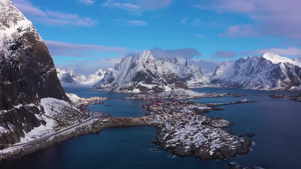 Reine Village and Mountains in Winter. Lofoten Islands, Norway. Aerial View