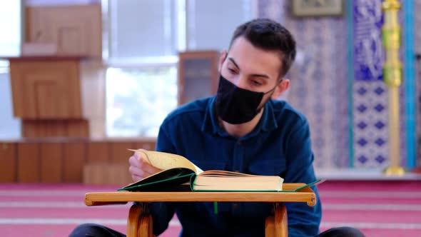 Young Muslim Masked Who Read Quran Mosque